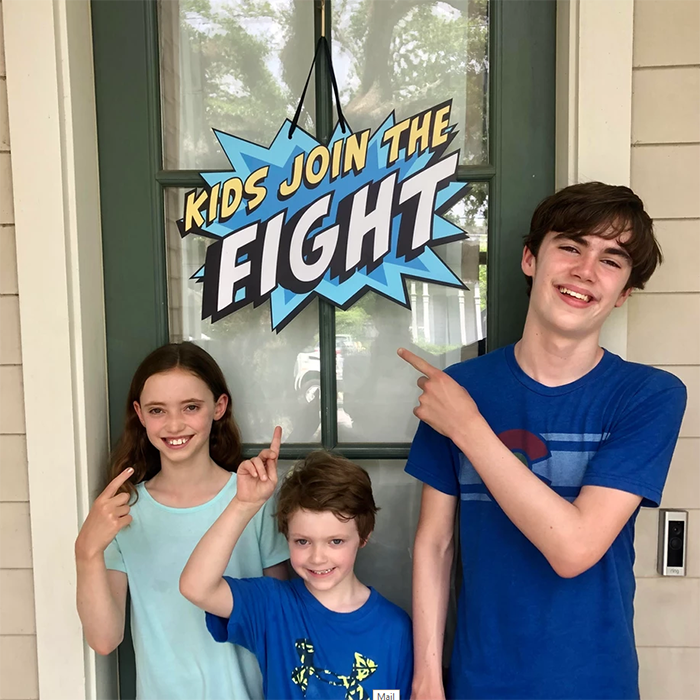 kjtf-kids-pointing-at-door